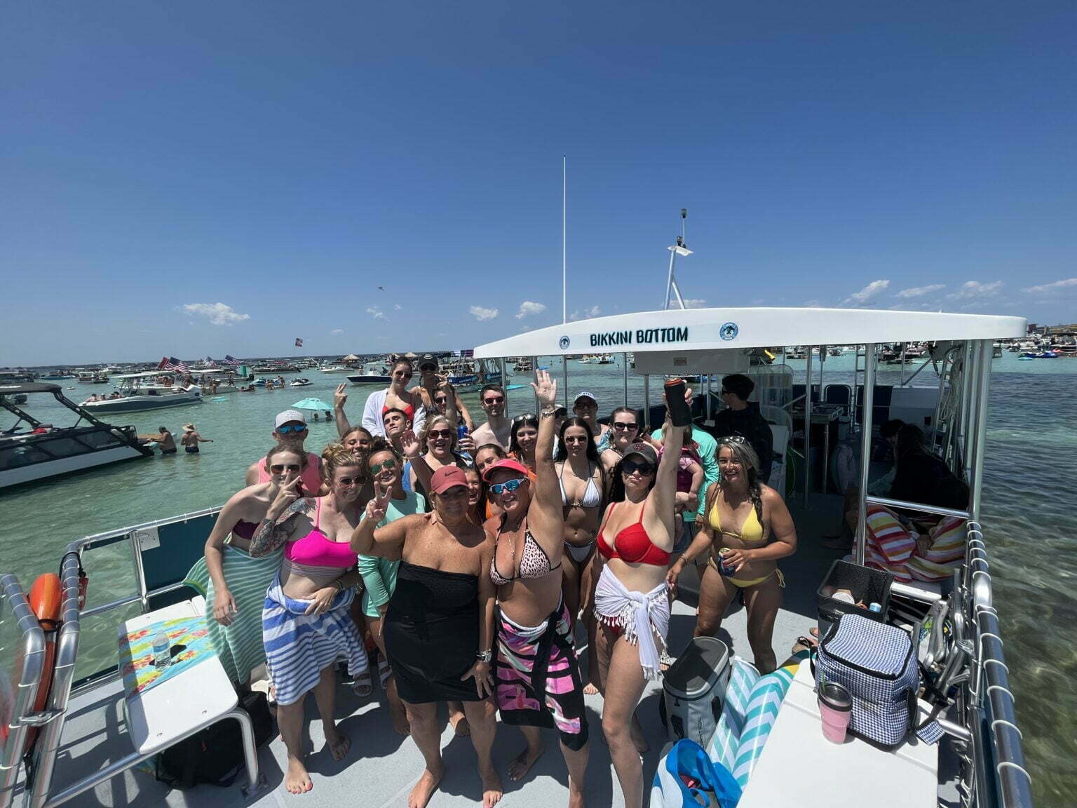 large group on crab island tours in fort walton beach on bikkini bottom from beach please charters