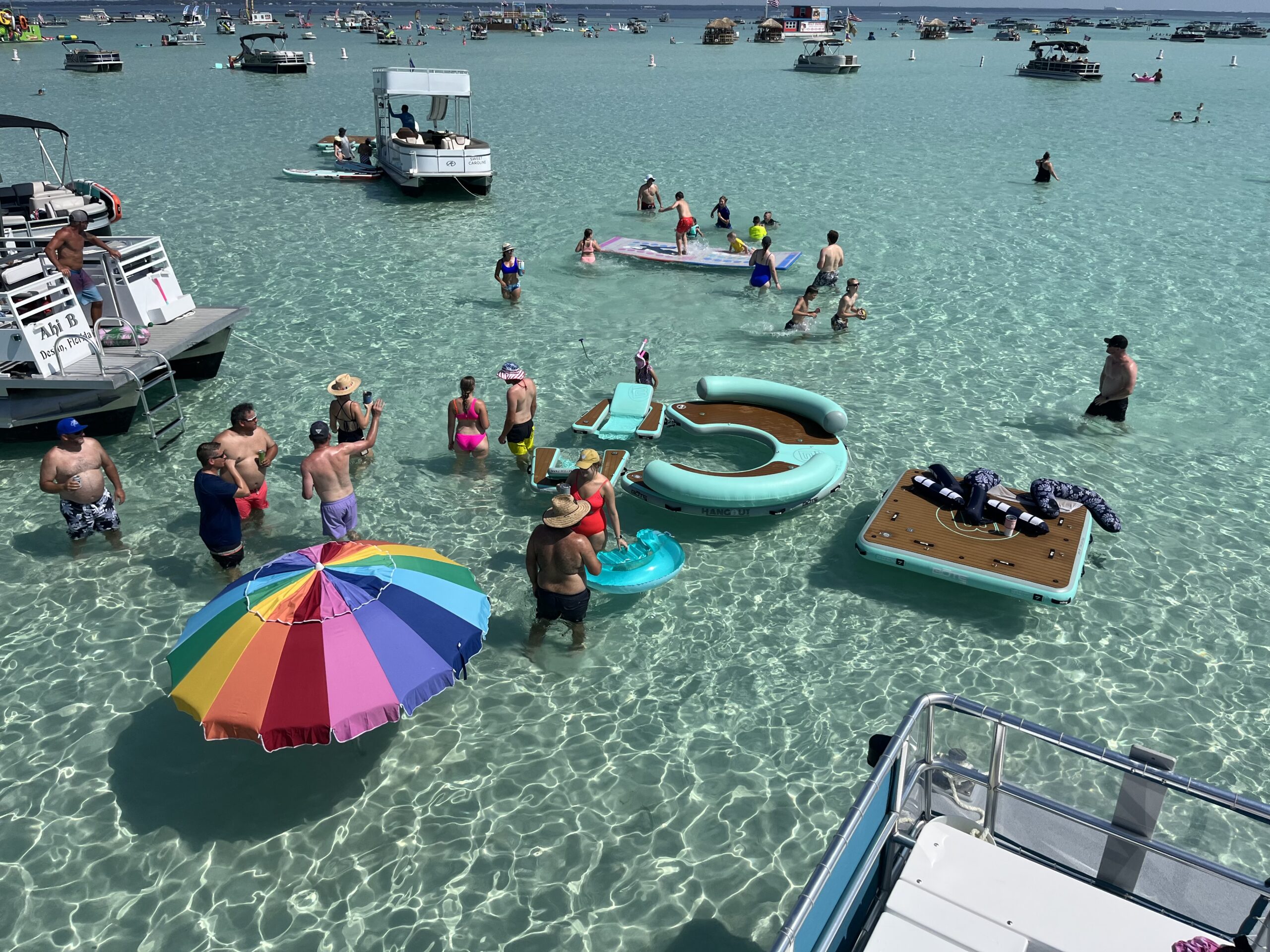 hanging out on floating toys at crab island in destin florida during bikkini bottom boat charter